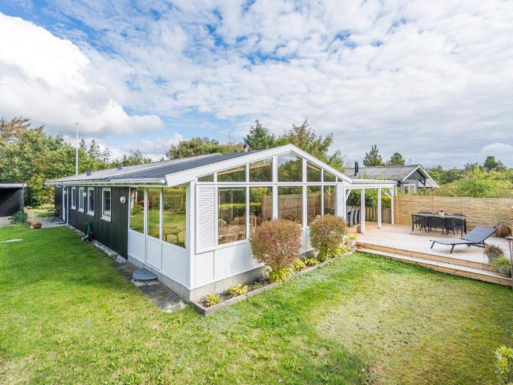 Stay at 6 person holiday home in Tarm-By Traum, Denmark, 5 min walk from the kitesurf spot Skaven Strand at Ringkøbing Fjord.