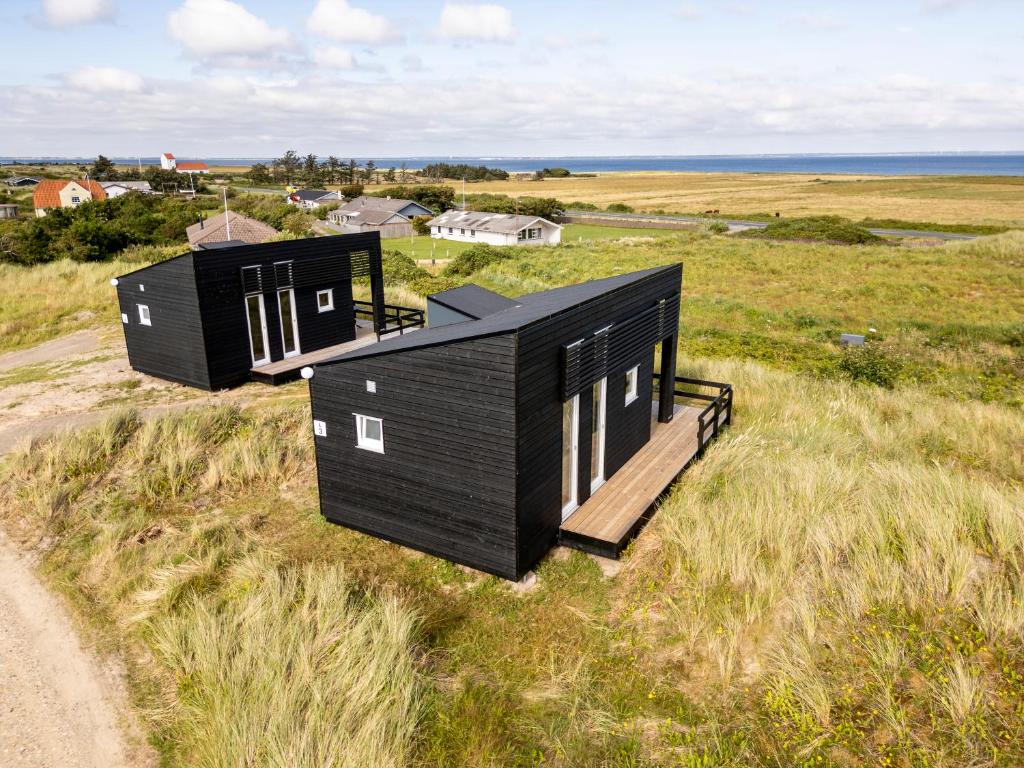 Stay at DCU-Camping Lyngvig Strand in Hvide Sande Nord, Denmark, 10 min bike from the kitesurf spot Hvide Sande Nord at Ringkøbing Fjord.