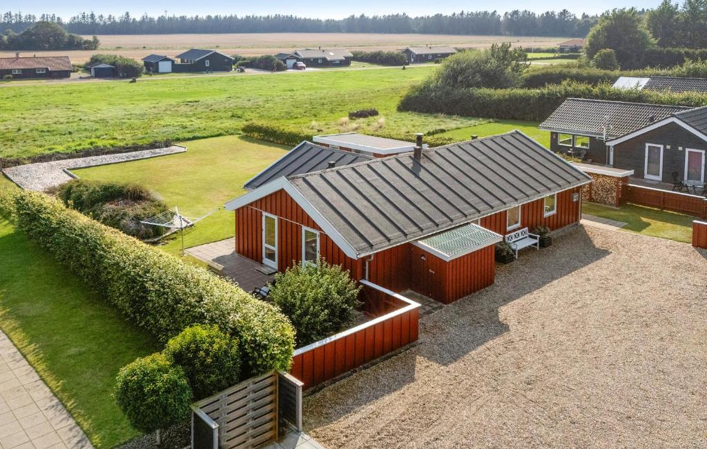 Stay at Nice Home In Tarm With Sauna, Denmark, 8 min walk from the kitesurf spot Skaven Strand at Ringkøbing Fjord.