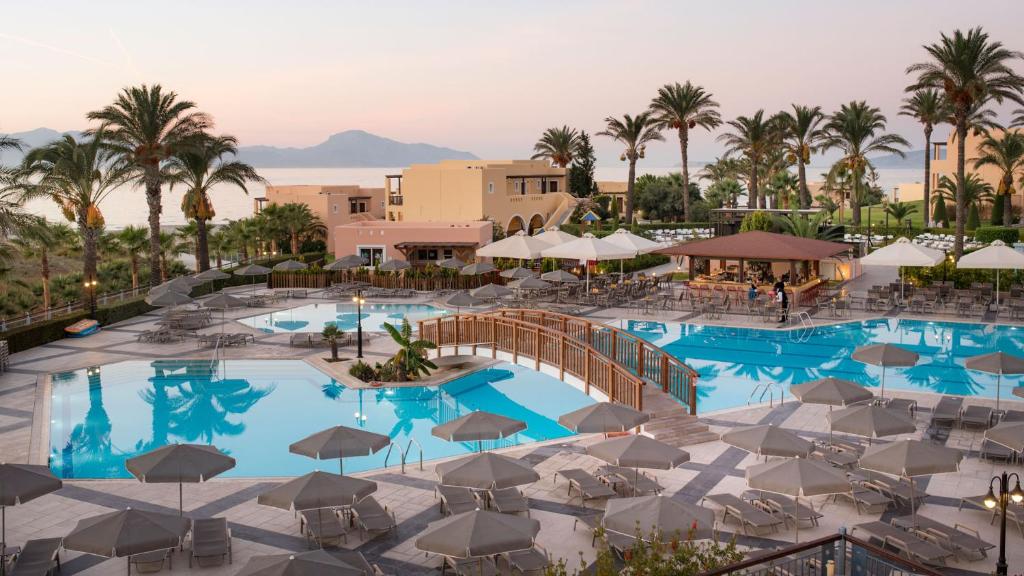 Stunning beach view at Horizon Beach Resort in Kos, Greece, showcasing the resort's modern facilities and pristine shoreline ideal for kitesurfing.