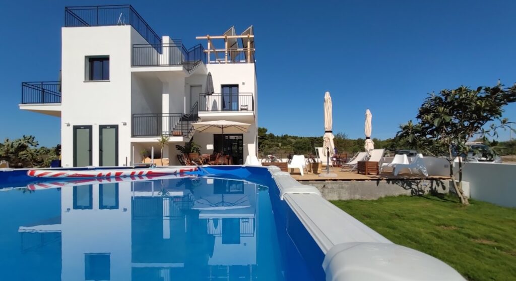 KiteGeneration Punta Trettu Kitesurf House at Punta Trettu, Sardina with boosted wind.