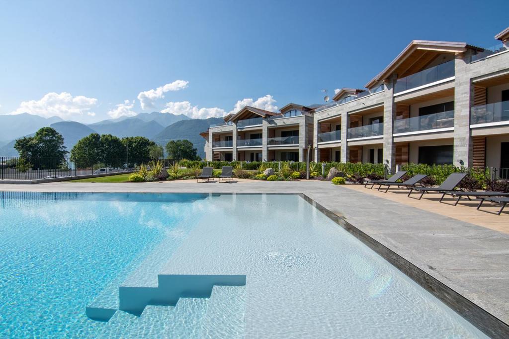 Lago Dorato Luxury Apartments right at kite spot Colico at Lake Como where you stay in a apartment or villa. Perfect for kitesurfers.