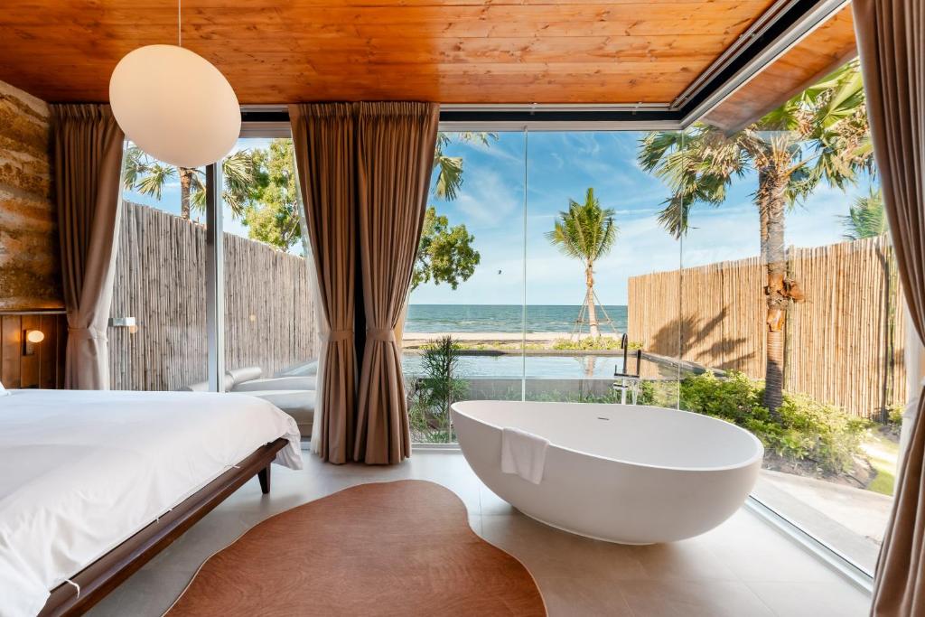 Furusato Shack Pranburi at Khao Kalok Beach, Pak Nam Pran, perfect for kitesurfing vacations.