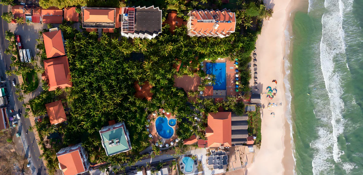 Beautiful view of Sea Lion Beach Resort in Mui Ne, Vietnam, with a serene beachfront perfect for kitesurfing and clear blue waters.